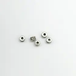 Kovový korálek - mezidíl tibetský váleček  6*3mm