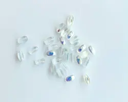 Korálek mačkaný ZRNKO 9/5mm crystal AB