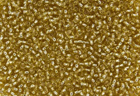 Rokajlové korálky - Round 11/0 :  Silver-Lined Lt Topaz TR-11-22 