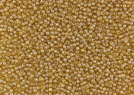 Rokajlové korálky Toho  - Round 15/0 : Transparent-Lustered Med Topaz TR-15-103B