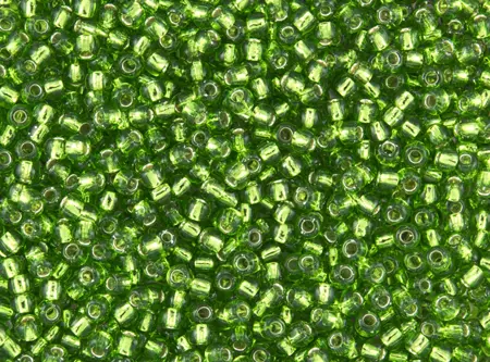 Rokajlové korálky Toho  - Round 15/0 : Silver-Lined Peridot TR-15-27